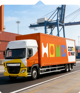 Orange delivery truck with HOME COSTWAY signage driving in a shipping yard.
